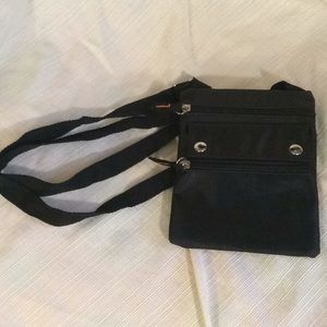 Women’s small cross body travel pack